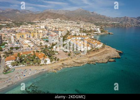 The drone aerial view of Nerja, Andalusia, Spain. Nerja is a municipality on the Costa del Sol in the province of Málaga. Stock Photo