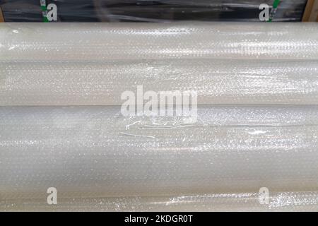 clear plastic wrap used to laminate metal roofing sheets Stock Photo