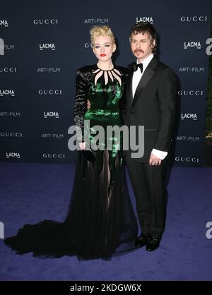 Julia Garner, Mark Foster attend the 2022 LACMA ART+FILM GALA Presented