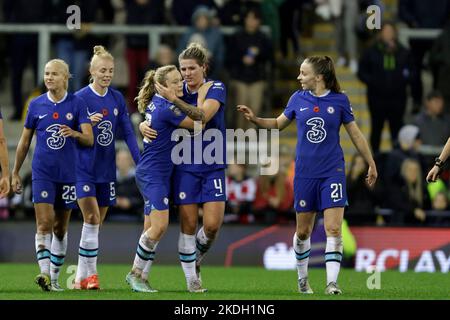 Chelsea players celebrate with Erin Cuthbert (centre) after she scores their side's third goal of the game during the Barclays Women's Super League match at Leigh Sports Village, Leigh. Picture date: Sunday November 6, 2022. Stock Photo