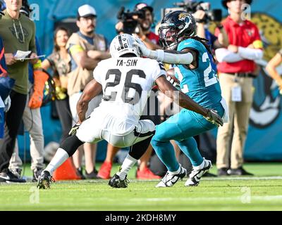 Jacksonville, Florida, USA. November 27, 2022: Baltimore Ravens cornerback  DAMARION WILLIAMS (22) walks onto the field during the Jacksonville Jaguars  vs Baltimore Ravens NFL game at TIAA Bank Field Stadium in Jacksonville