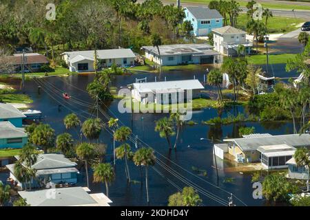 Surrounded by hurricane Ian rainfall flood waters homes in Florida residential area. Consequences of natural disaster Stock Photo