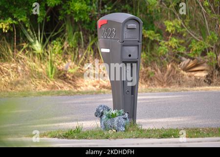 Typical american outdoors mail box on suburban street side Stock Photo
