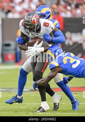 Tampa, United States. 06th Nov, 2022. Los Angeles Rams' Nick Scott (33) and Derion Kendrick (C) wrap up Tampa Bay Buccaneers' Julio Jones (6) during the first half at Raymond James Stadium in Tampa, Florida on Sunday, November 6, 2022. Photo by Steve Nesius/UPI Credit: UPI/Alamy Live News Stock Photo