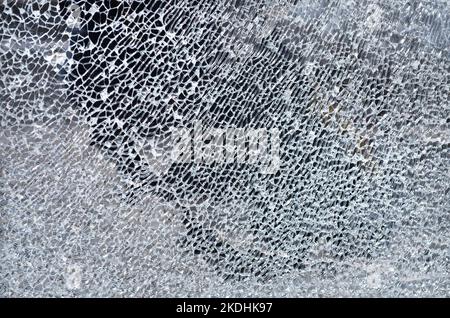 Broken glass texture, full frame. Can be used as an abstract background with copy space. Stock Photo