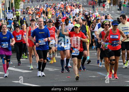 New York, USA. 6th Nov, 2022. Runners pack a street in the Bronx during the TCS New York City Marathon. Credit: Enrique Shore/Alamy Live News Stock Photo