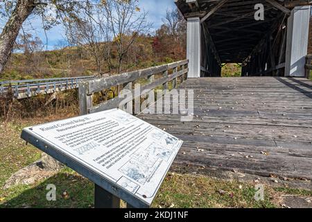 Marietta, Ohio, USA-Oct. 25, 2022: Informational sign at the historic Rinard Covered Bridge in rural Washington County. Stock Photo