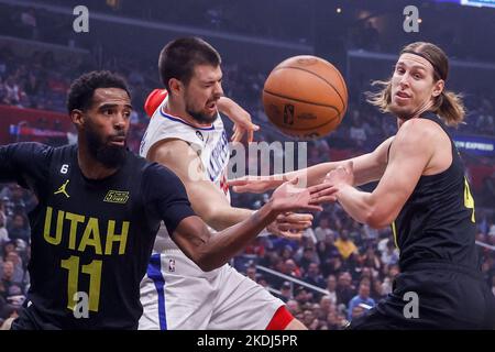 Los Angeles, California, USA. 6th Nov, 2022. Los Angeles Clippers center Ivica Zubac (40) fights for the rebound against Utah Jazz forward Kelly Olynyk (41) and guard Mike Conley (11) during an NBA basketball game Sunday, Nov. 6, 2022, in Los Angeles. (Credit Image: © Ringo Chiu/ZUMA Press Wire) Credit: ZUMA Press, Inc./Alamy Live News Stock Photo