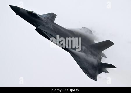 Guangzhou. 5th Nov, 2022. A J-20 stealth fighter jet flies during a training for the upcoming 14th Airshow China in south China's Guangdong Province Nov. 5, 2022. The Chinese People's Liberation Army (PLA) Air Force will showcase an array of aircraft at the upcoming 14th Airshow China to be held from Nov. 8 to 13 in Zhuhai of Guangdong Province, a PLA Air Force spokesperson said on Sunday. Credit: Yu Hongchun/Xinhua/Alamy Live News Stock Photo