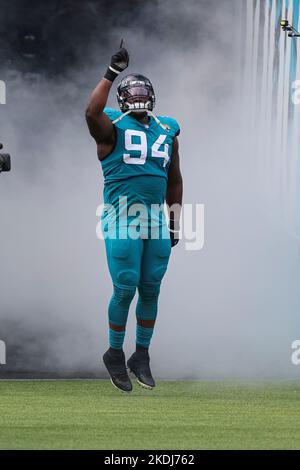 Saturday, November 6, 2022; Jacksonville, FL USA;  Jacksonville Jaguars defensive tackle Folorunso Fatukasi (94) runs from the tunnel at the start of Stock Photo