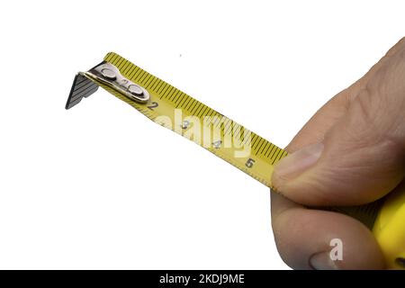a male hand with a flexible measuring tape   on a transparent background Stock Photo