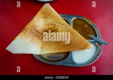 July 5th 2022 Katra, Jammu and Kashmir, India. South Indian masala dosa served with sambhar and coconut chutney. Stock Photo