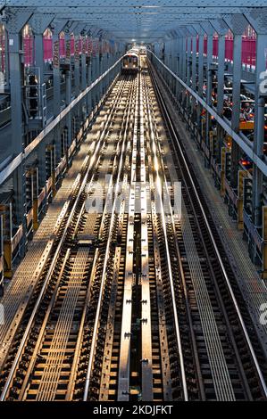 Metro train tracks on a bridge in New York City Stock Photo