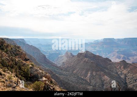 Tranquil View Of Majestic Rocky Mountains Against Cloudy Sky Stock Photo