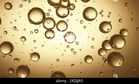 Golden round droplets flow in yellow blank background. Motion graphic particles template copy space Stock Photo