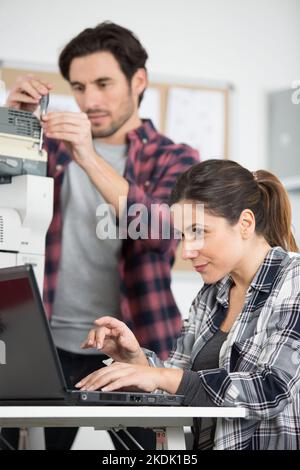 team of technicians working together Stock Photo