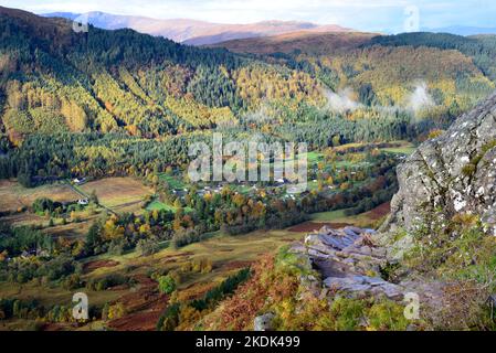 Looking down Glen Nevis from the first section of the tourist path up Ben Nevis, showing the autumn colours and also the glen set between the slopes. Stock Photo