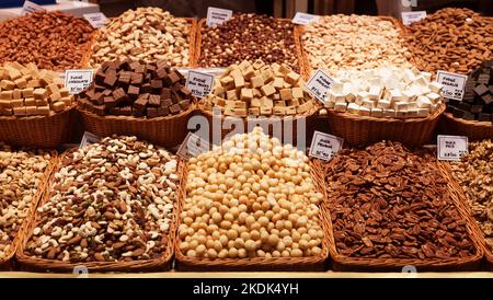 nuts and dried fruits on the counter in the market Stock Photo