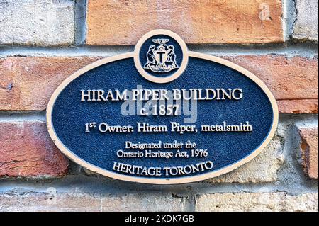 Toronto, Canada - November 5, 2022: Heritage plaque in the Hiram Piper building. Stock Photo