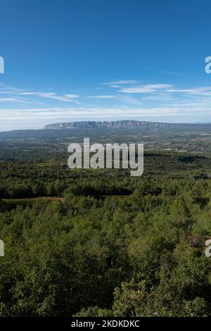Vertical panorama of the iconic Mont Sainte Victoire with copy space in the blue sky, Provence, South of France Stock Photo