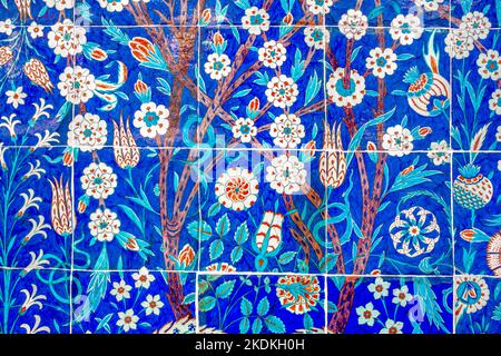 Blue background floral tiles on the Mosque wall. Stock Photo