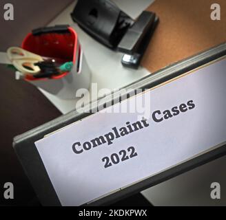 Complaint Cases 2022 lever arch file, containing separate issues and cases, in an office environment Stock Photo