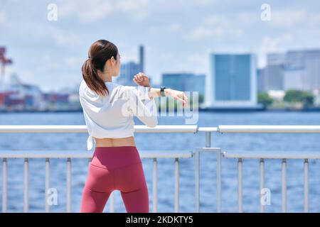 Young Japanese training downtown Stock Photo