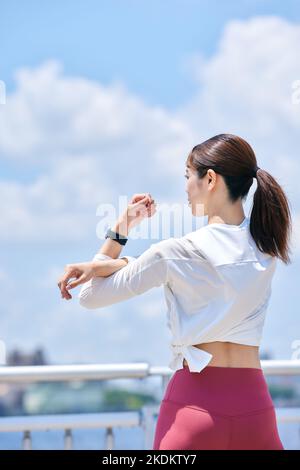 Young Japanese training downtown Stock Photo