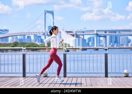 Young Japanese training downtown Stock Photo