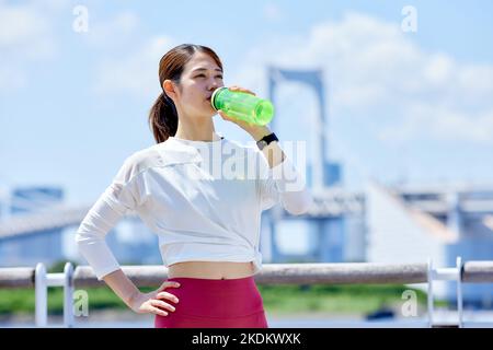 Young Japanese training downtown Stock Photo
