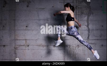 Young Japanese training downtown Stock Photo