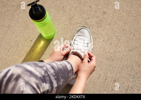 Young Japanese training downtown Stock Photo