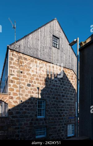 3 November 2022. Peterhead, Aberdeenshire, Scotland. This is a sunshine shadow of the Gable End of a building on a neighbouring one in James Street, P Stock Photo