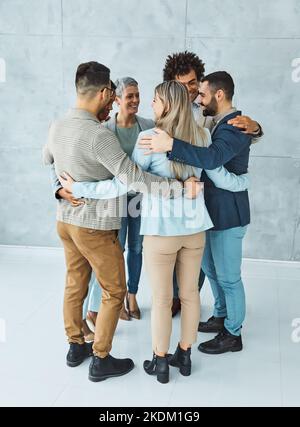business teamwork together support group colleague businessman businesswoman team office startup student young colleague holding hug Stock Photo