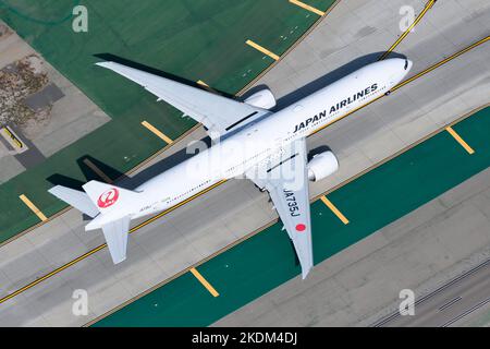 Japan Airlines Boeing 777 airplane taxiing Aircraft 77W of Japan Airlines / JAL Airlines. Plane JA735J of 777-300ER model. Stock Photo