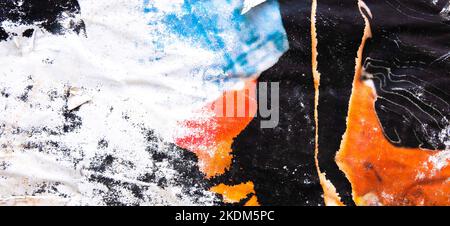 Old grunge torn collage posters creased crumpled paper placard texture background. Ripped faded paper backdrop surface placard Stock Photo