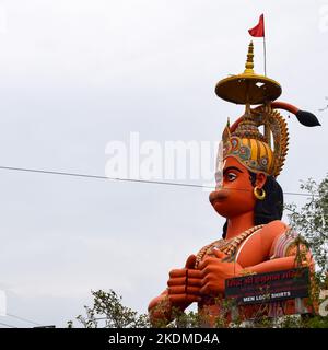 Big statue of Lord Hanuman near the delhi metro bridge situated near Karol Bagh, Delhi, India, Lord Hanuman big statue touching sky Stock Photo