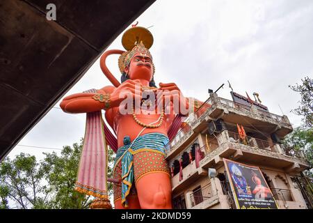 Big statue of Lord Hanuman near the delhi metro bridge situated near Karol Bagh, Delhi, India, Lord Hanuman big statue touching sky Stock Photo