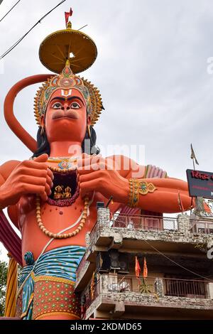 Big statue of Lord Hanuman near the delhi metro bridge situated near Karol Bagh, Delhi, India, Lord Hanuman big statue touching sky Stock Photo