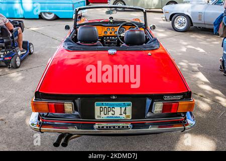 Des Moines, IA - July 01, 2022: High perspective rear view of a 1970 Triumph TR6 Convertible at a local car show. Stock Photo