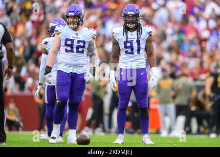 Landover, MD, USA. 6th Nov, 2022. Minnesota Vikings defensive tackle James  Lynch (92) and Minnesota Vikings linebacker Patrick Jones II (91) line up  at the line of scrimmage during the NFL game