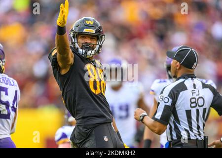 Washington Commanders cornerback Benjamin St-Juste (25) intercepts a pass  intended for Minnesota Vikings wide receiver Justin Jefferson (18) during  the second half of a NFL football game between the Washington Commanders and