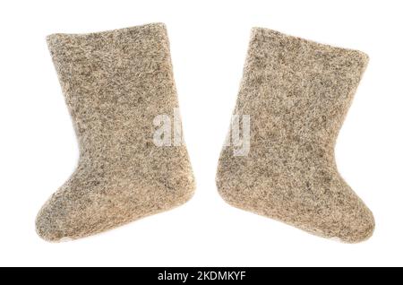 valenki - russian felt boots on white background. Stock Photo