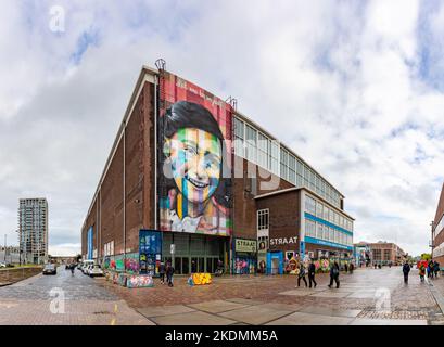 A picture of the Let Me Be Myself colorful mural, depicting Anne Frank, created by Eduardo Kobra in 2016, on the wall of the STRAAT Museum. Stock Photo