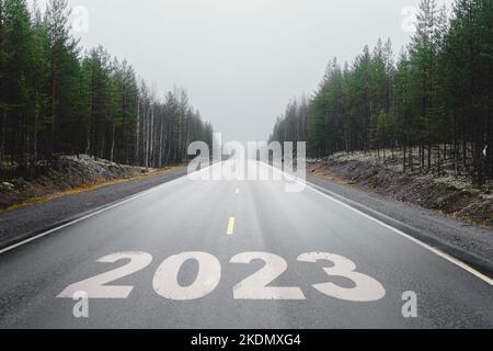 Highway with the inscription 2023. New Year 2023. A murky future. High quality photo Stock Photo