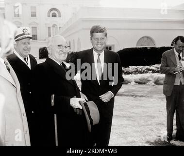 Photograph of President John F. Kennedy, on his first full day in office, greeting former President Harry S. Truman - 21 January 1961 Stock Photo