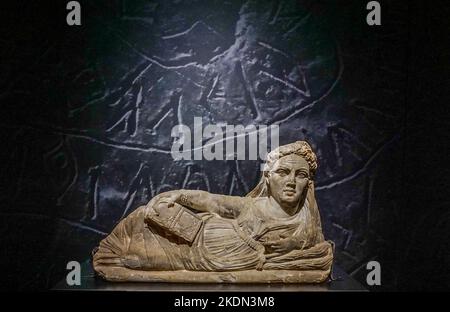 Etruscan funeral urn of a deceased woman on display in the Museum of Roman History, Nimes France. Stock Photo