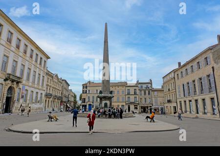 The Place de la République, Arles, France. The city centre of Arles, France. The obelisk dates back to the 4th century. Stock Photo