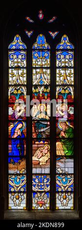 Stained-glass window depicting The Nativity of Jesus. Notre-Dame de Luxembourg (Notre-Dame Cathedral in Luxembourg). Stock Photo