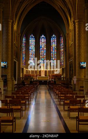 The central altar and stained-glass windows above it in the Notre-Dame de Luxembourg (the Notre-Dame Cathedral in Luxembourg). Stock Photo